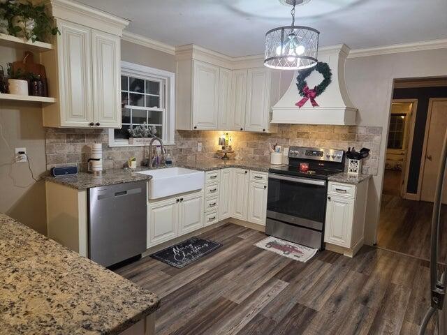 2596 Keith Valley Road Southeast Cleveland, TN 37323 - Photo 12 of 24 a kitchen with stainless steel appliances granite countertop a stove and a sink
