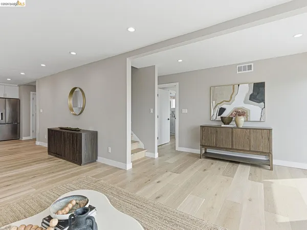 a view of a balcony with wooden floor