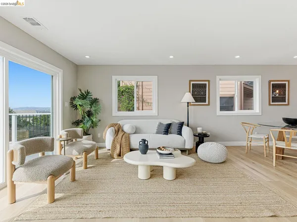 a kitchen with stainless steel appliances a refrigerator sink and cabinets