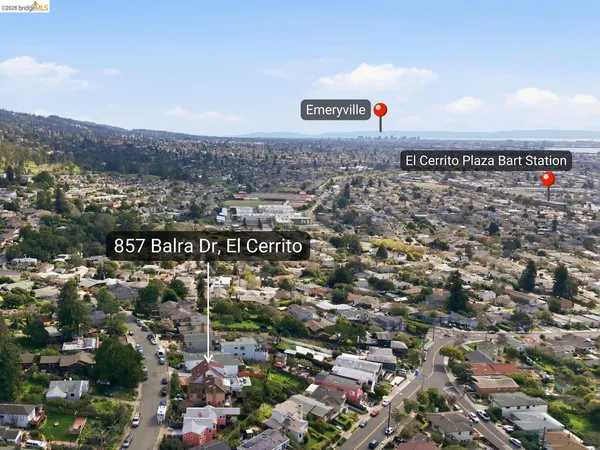 a picture of a bench in front of a building