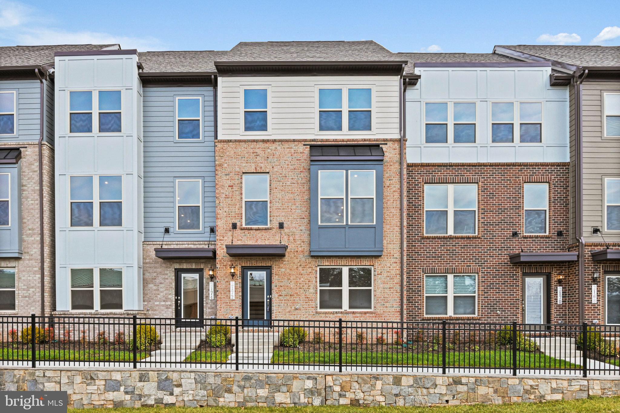 2172 Glacier Road Herndon, VA 20170 - Photo 2 of 33 a front view of a building with street