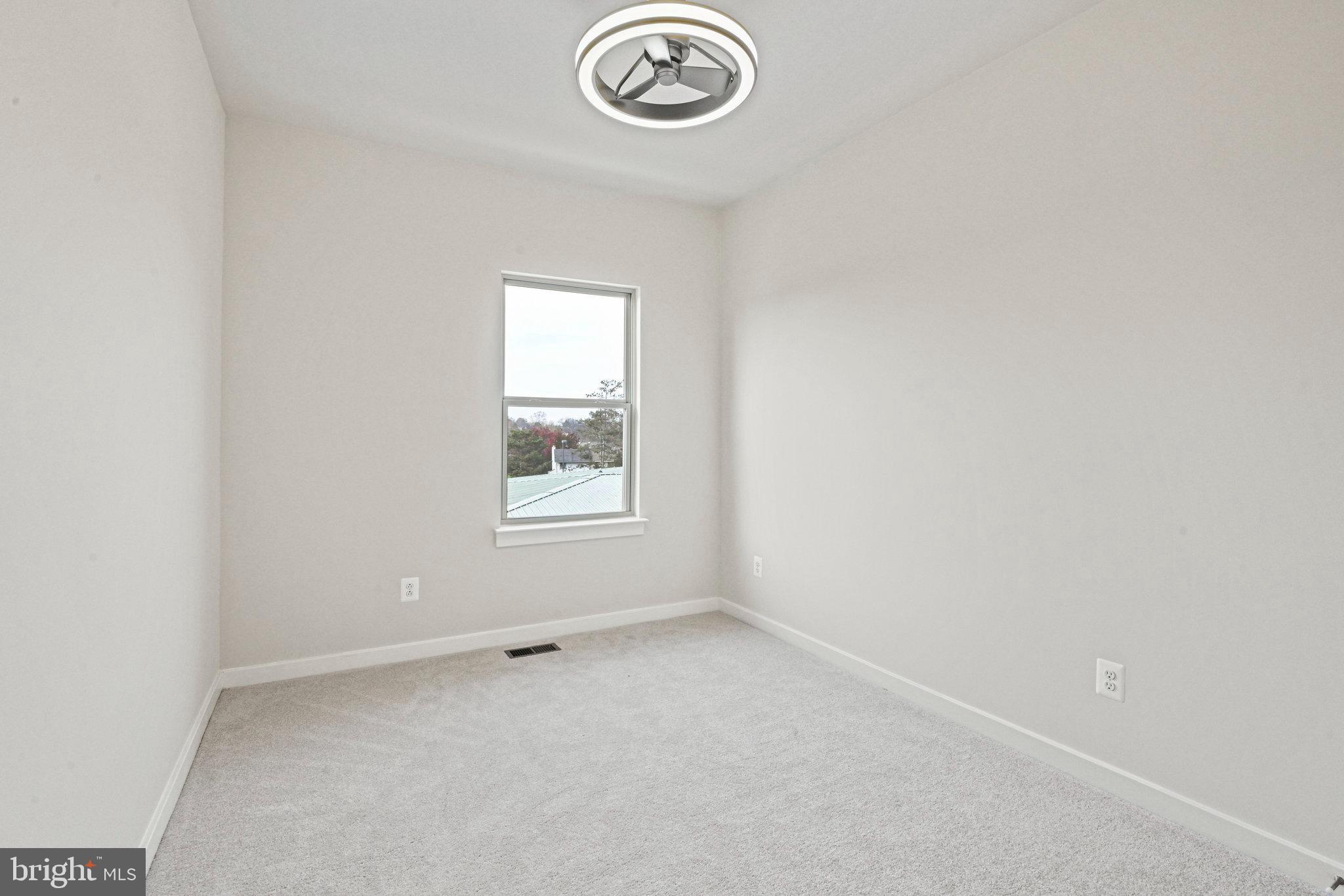 2172 Glacier Road Herndon, VA 20170 - Photo 21 of 33 an empty room with a window