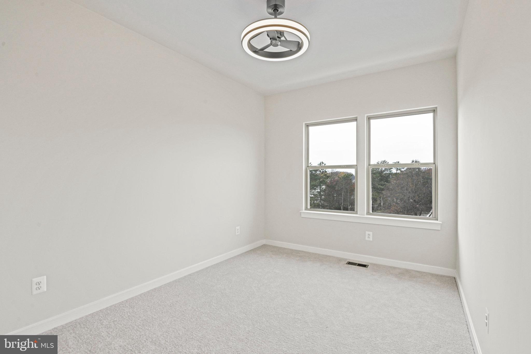 2172 Glacier Road Herndon, VA 20170 - Photo 23 of 33 an empty room with a window