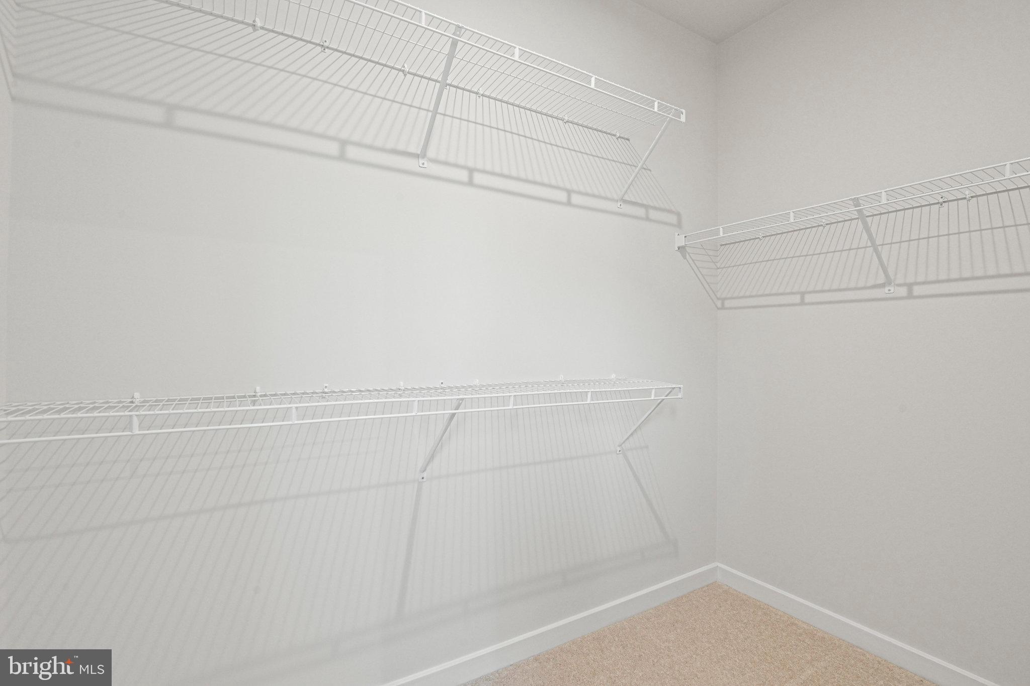 2172 Glacier Road Herndon, VA 20170 - Photo 29 of 33 a view of a room with racks on the wall