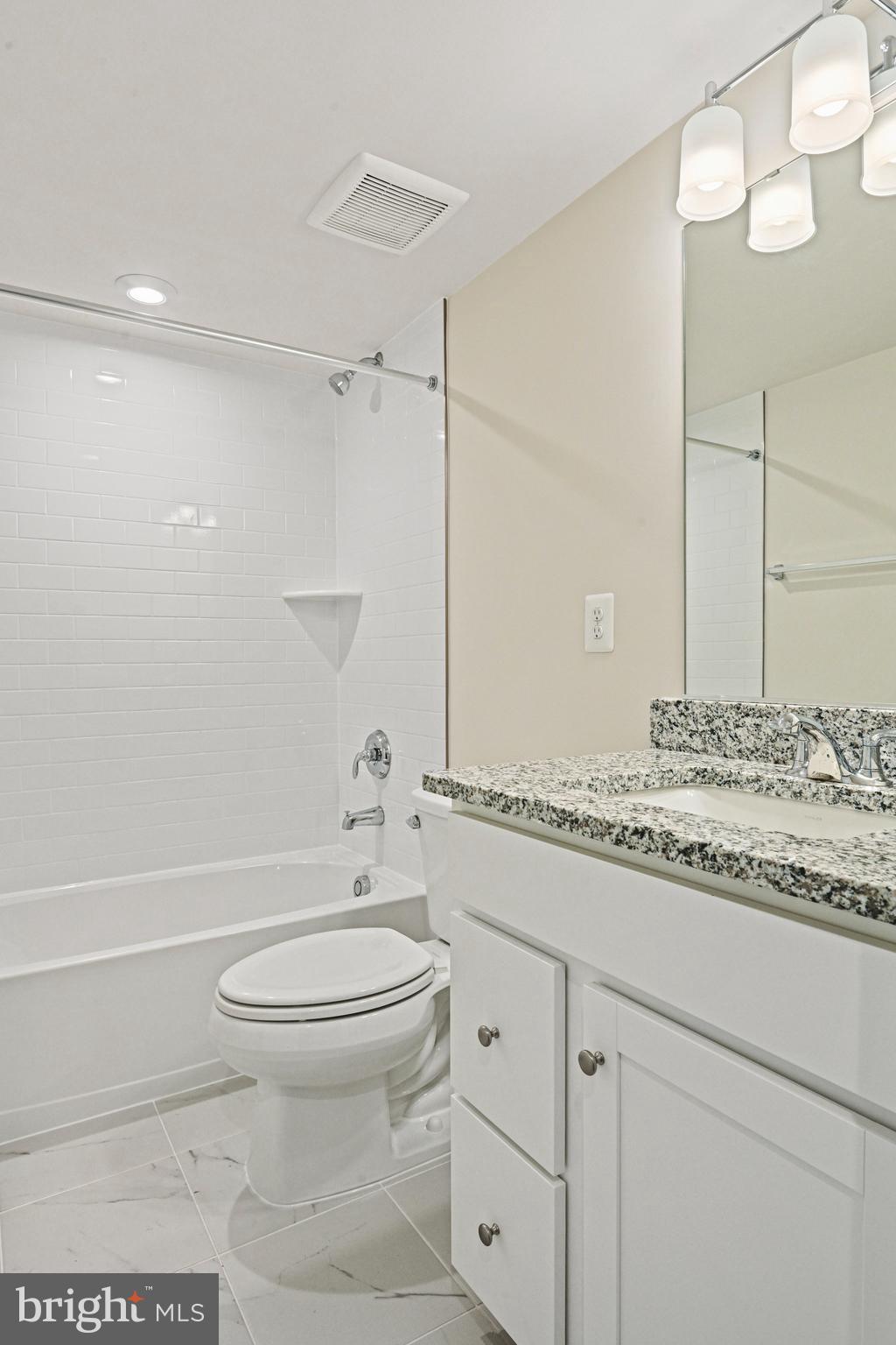 2172 Glacier Road Herndon, VA 20170 - Photo 8 of 33 a bathroom with a granite countertop sink toilet and shower