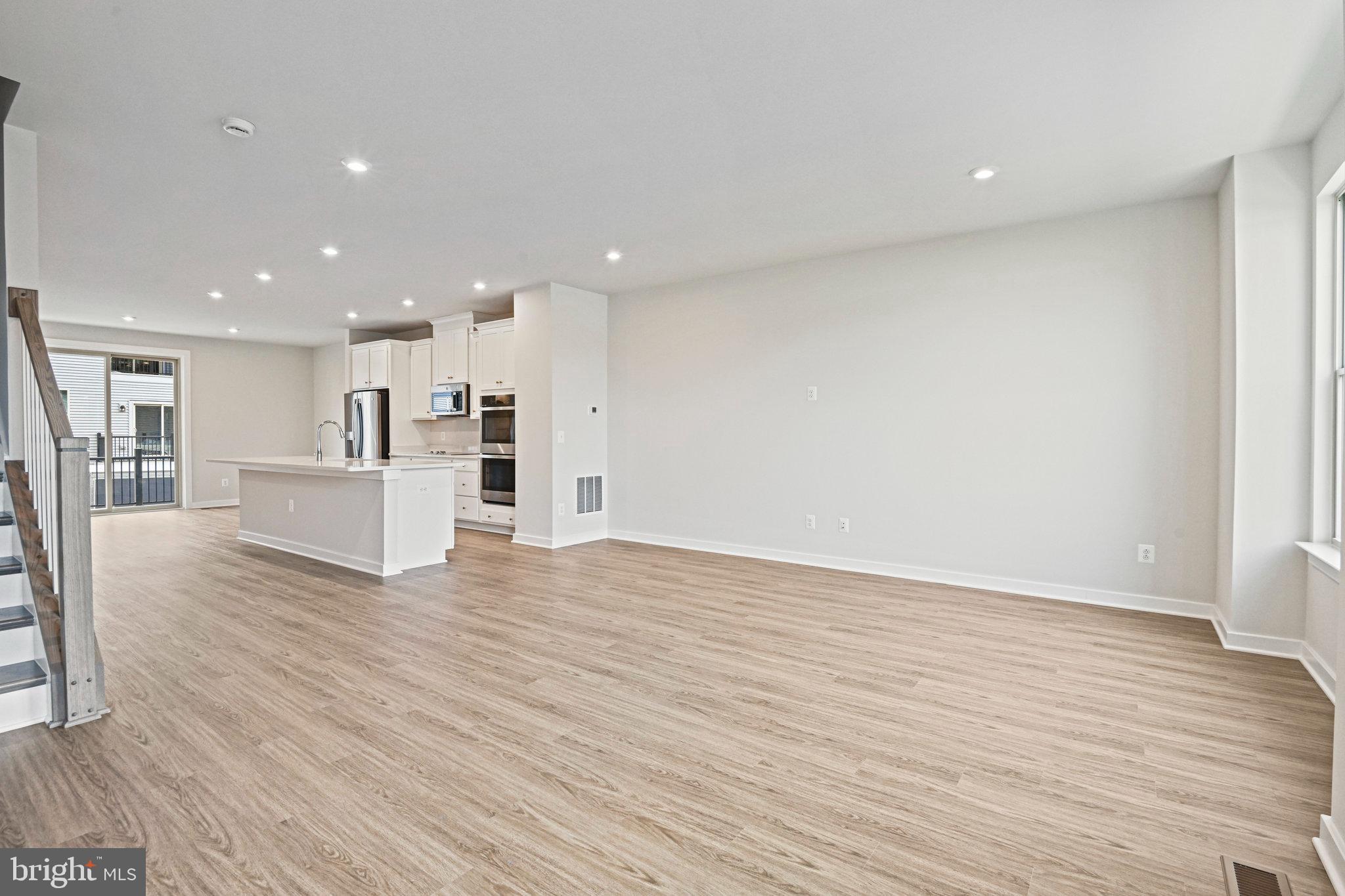 2172 Glacier Road Herndon, VA 20170 - Photo 10 of 33 a view of kitchen with wooden floor and windows