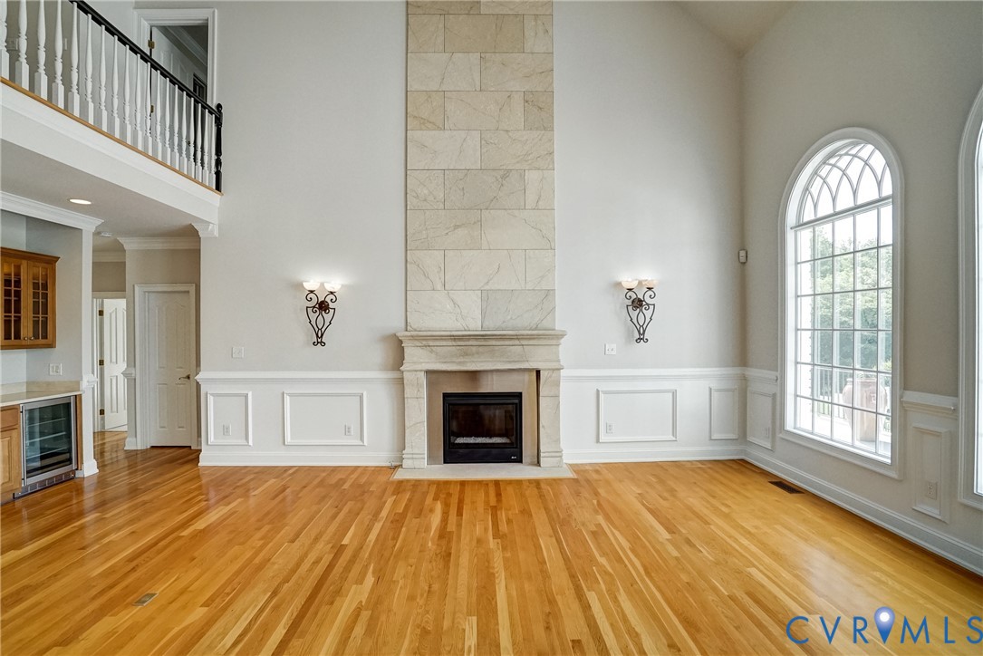 721 Meadow View Ridge Manakin-Sabot, VA 23103 - Photo 5 of 45 a view of an empty room with wooden floor and a window