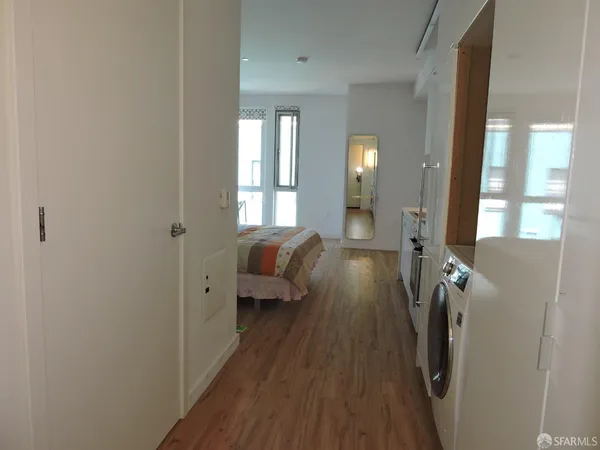 a bathroom with a toilet and a bathtub