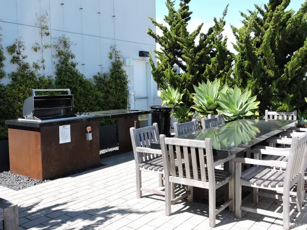 a view of a terrace with seating area