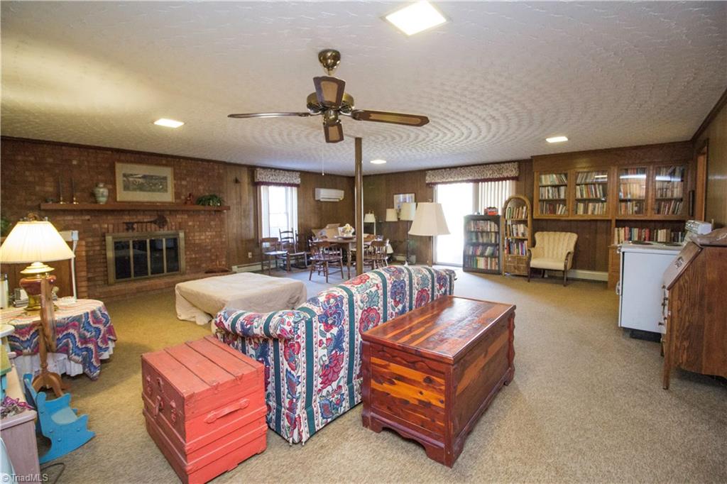 311 Ralph Drive Archdale, NC 27263 - Photo 26 of 30 full walk out basement with mini split heat/air system and gas logs