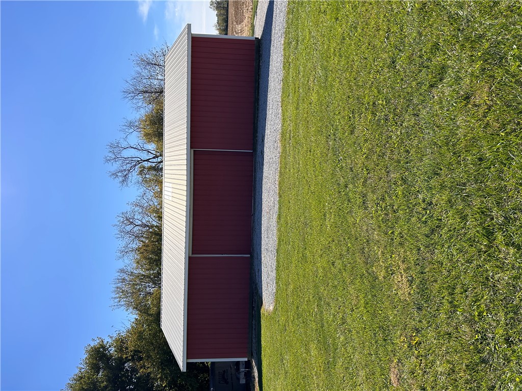 2086 Scheyhing Road Lewisburg, OH 45338 - Photo 22 of 29 This expansive barn provides ample storage and utility for various needs.