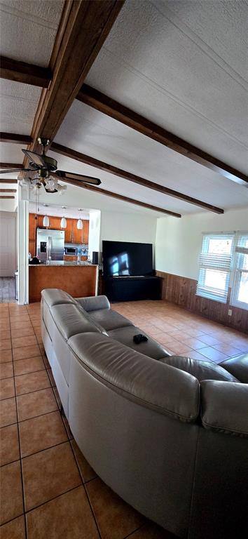 14820 County Road 48 Astatula, FL 34705 - Photo 5 of 12 a living room with furniture and a flat screen tv