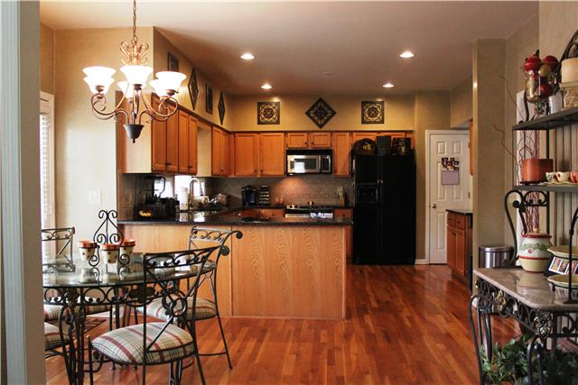 437 Ridgestone Drive Franklin, TN 37064 - Photo 6 of 20 Eat-in kitchen area w/lots of natural light & door giving access to backyard & patio.