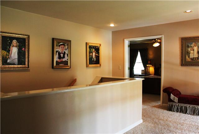437 Ridgestone Drive Franklin, TN 37064 - Photo 9 of 20 Upstairs landing open to two story entry.