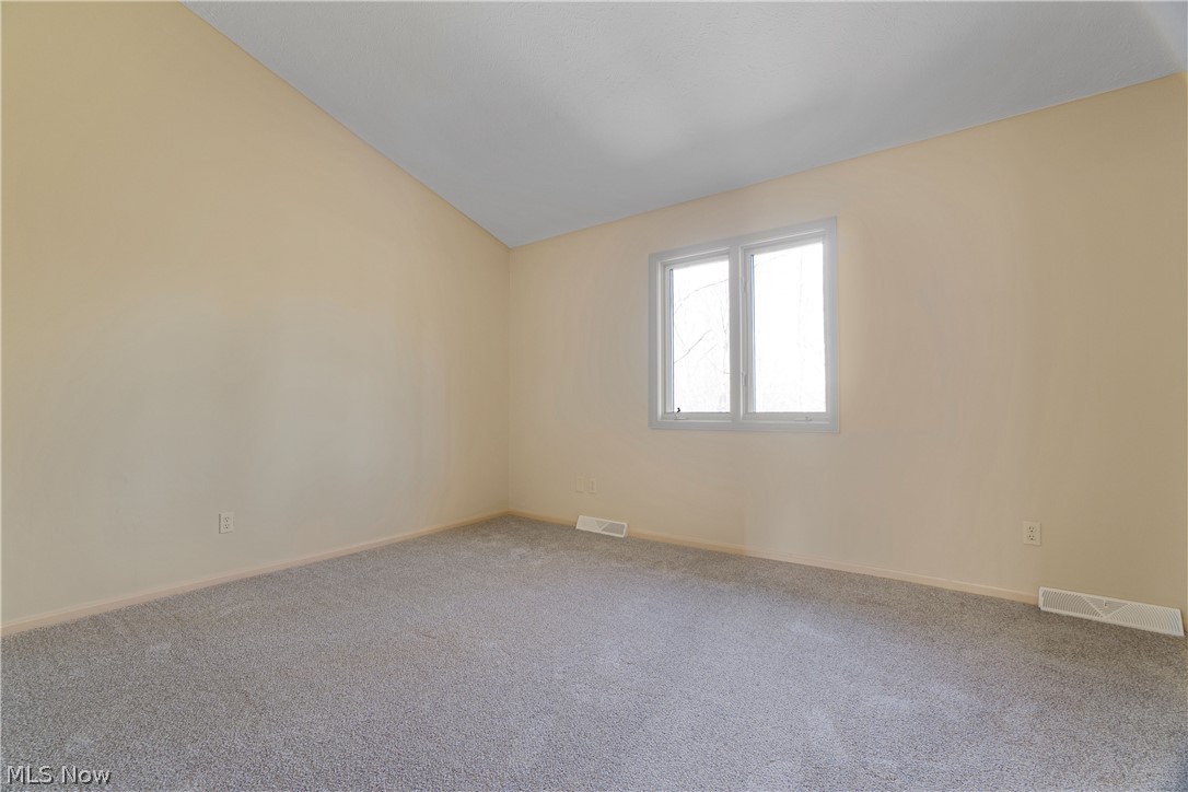 29329 Eddy Road Wickliffe, OH 44092 - Photo 31 of 50 5th bedroom featuring lofted ceiling, carpet floors and a large closet