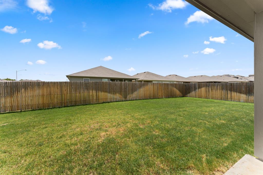 15217 Upland Willow Road Austin, TX 78724 - Photo 22 of 25 View of fenced backyard