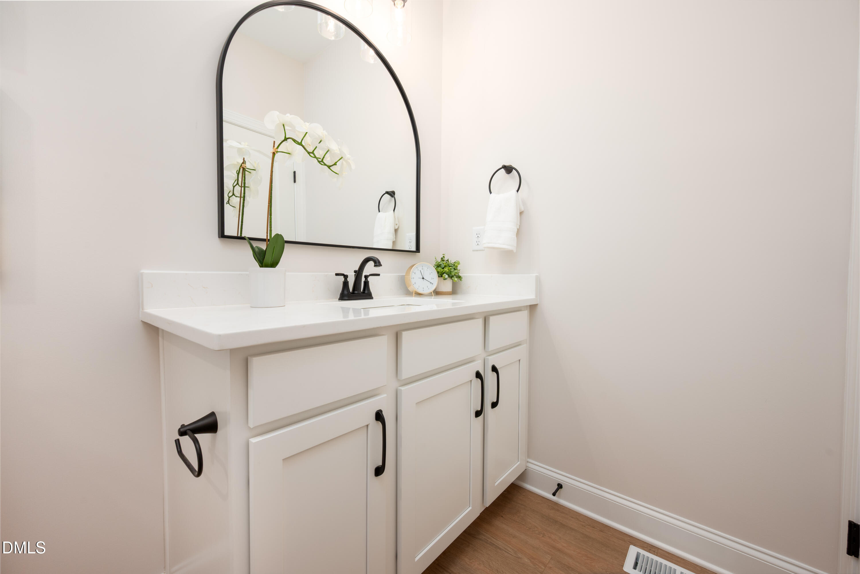 2275 Peachtree Hills Road Spring Hope, NC 27882 - Photo 30 of 43 a bathroom with a sink and a mirror