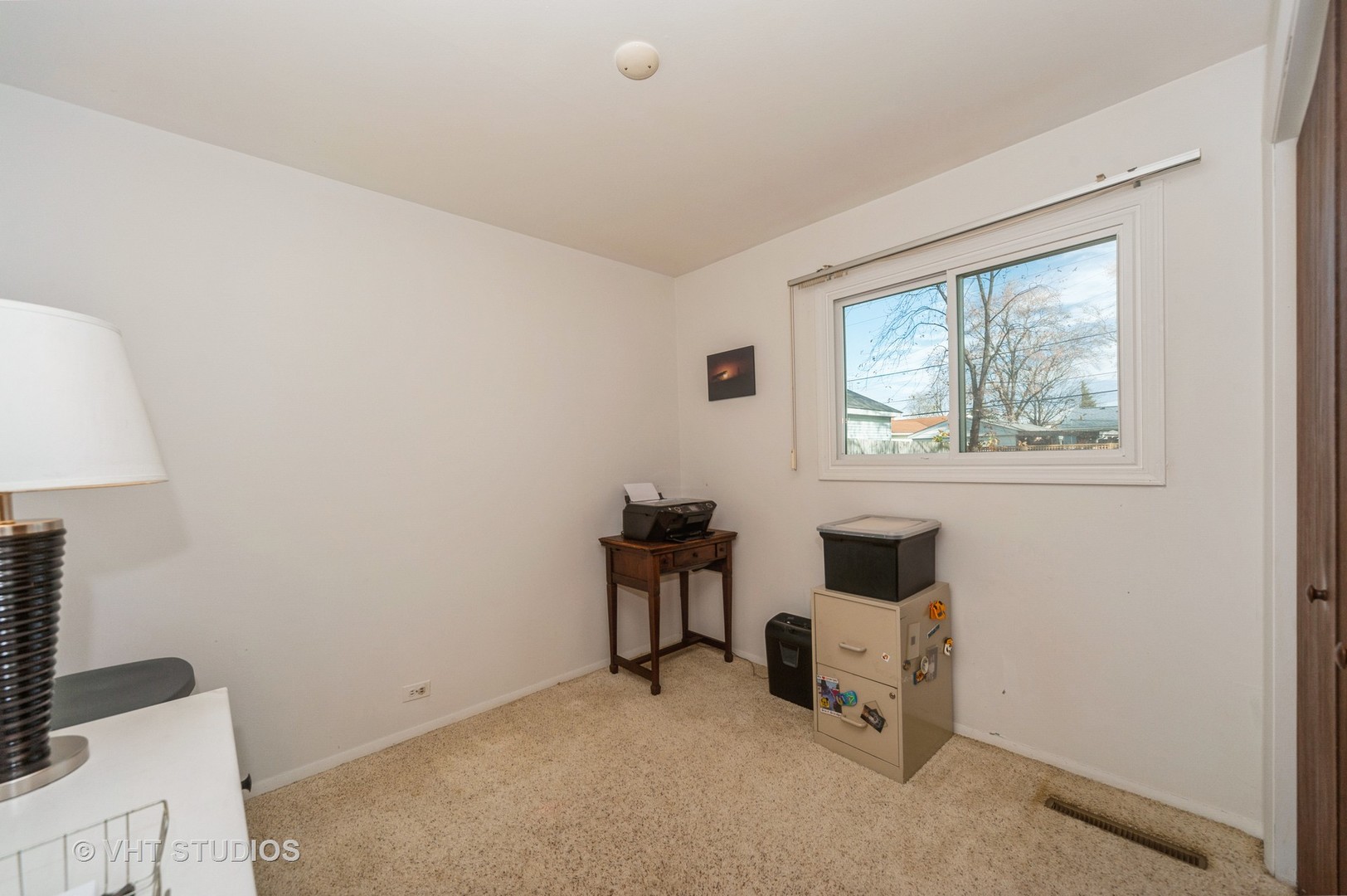 155 East Dennis Road Wheeling, IL 60090 - Photo 8 of 10 a view of workspace with furniture and window
