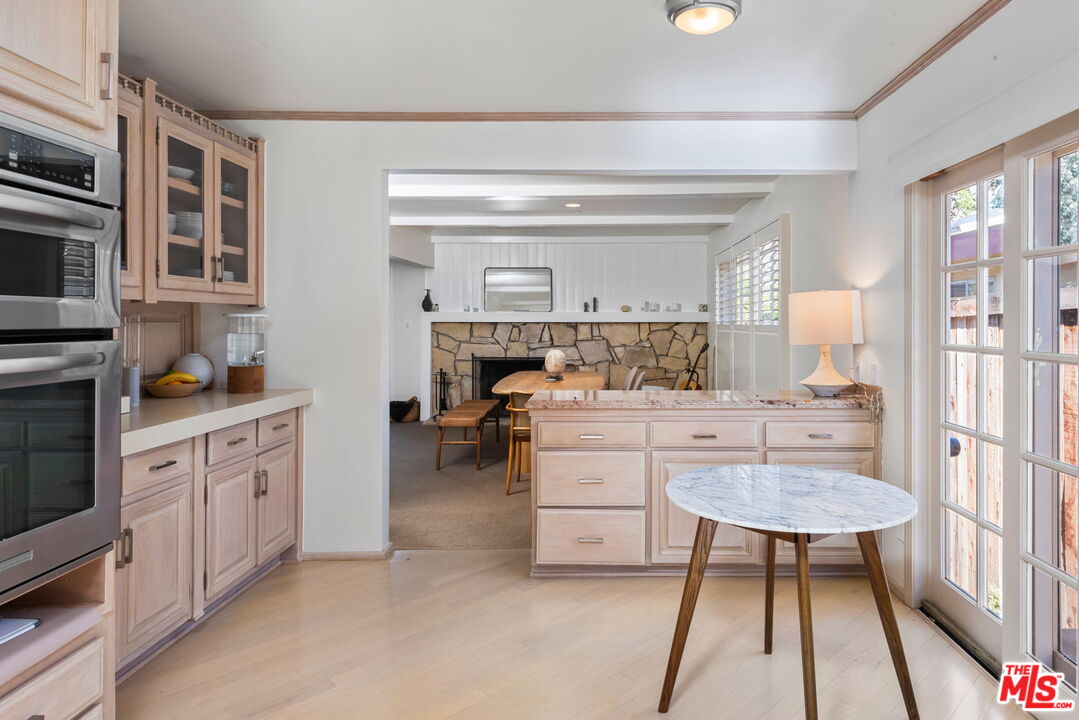 4247 Sespe Avenue Sherman Oaks, CA 91403 - Photo 14 of 31 a room with furniture a rug and a window