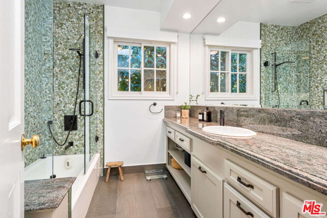 4247 Sespe Avenue Sherman Oaks, CA 91403 - Photo 19 of 31 a kitchen with a sink and a large window