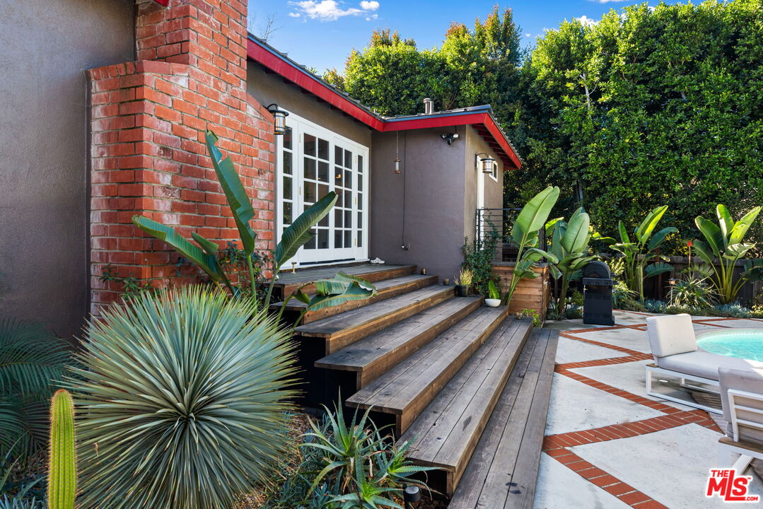4247 Sespe Avenue Sherman Oaks, CA 91403 - Photo 31 of 31 a view of backyard with a deck and furniture