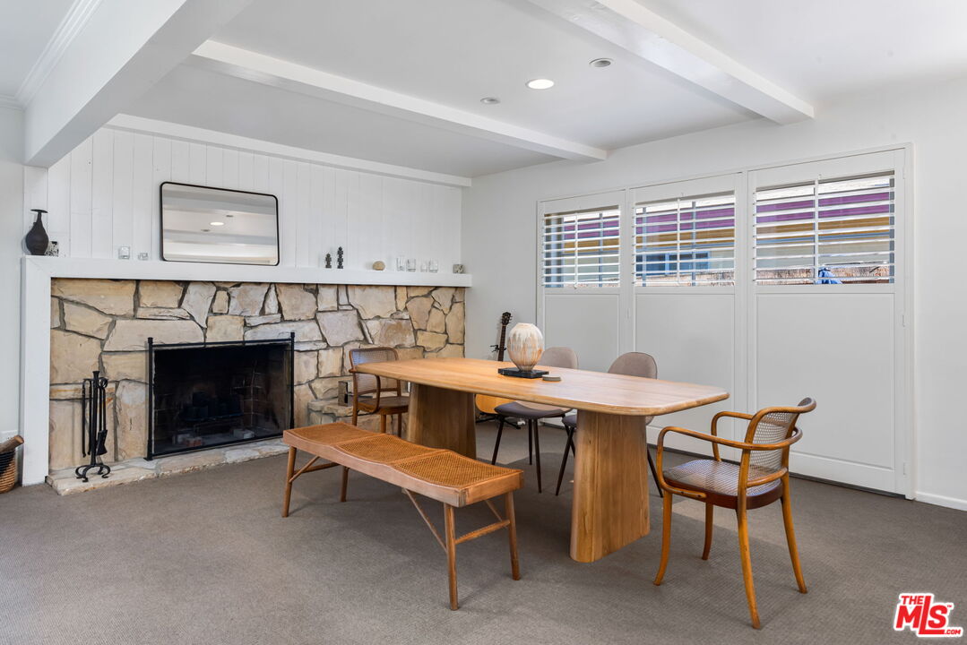 4247 Sespe Avenue Sherman Oaks, CA 91403 - Photo 8 of 31 a view of a livingroom with furniture and a fireplace