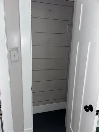 a view of a small house in the backyard