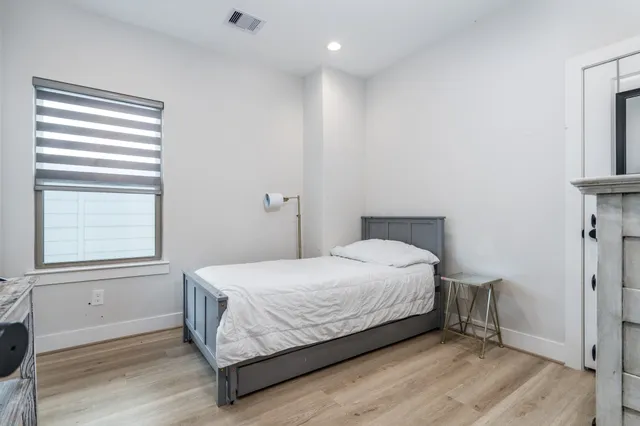 a bathroom with a double vanity sink mirror and double