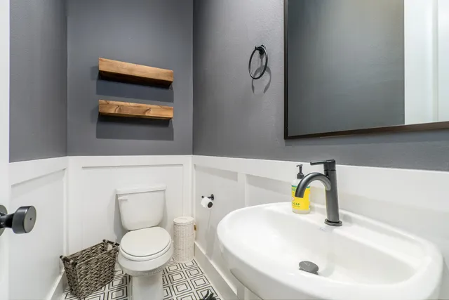 a bedroom with a bed and furniture