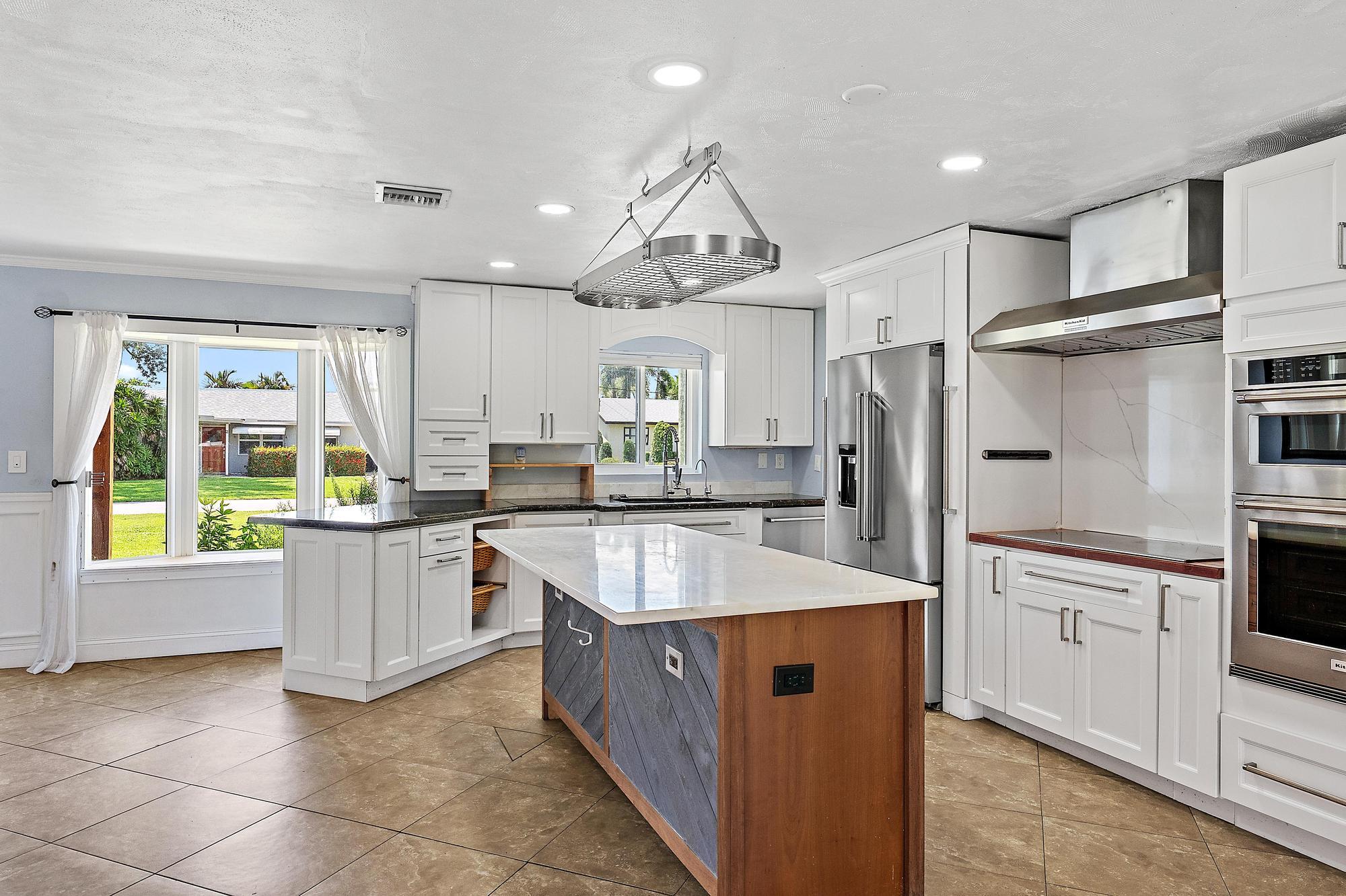 1 Windsor Road West Jupiter, FL 33469 - Photo 3 of 29 Kitchen with window