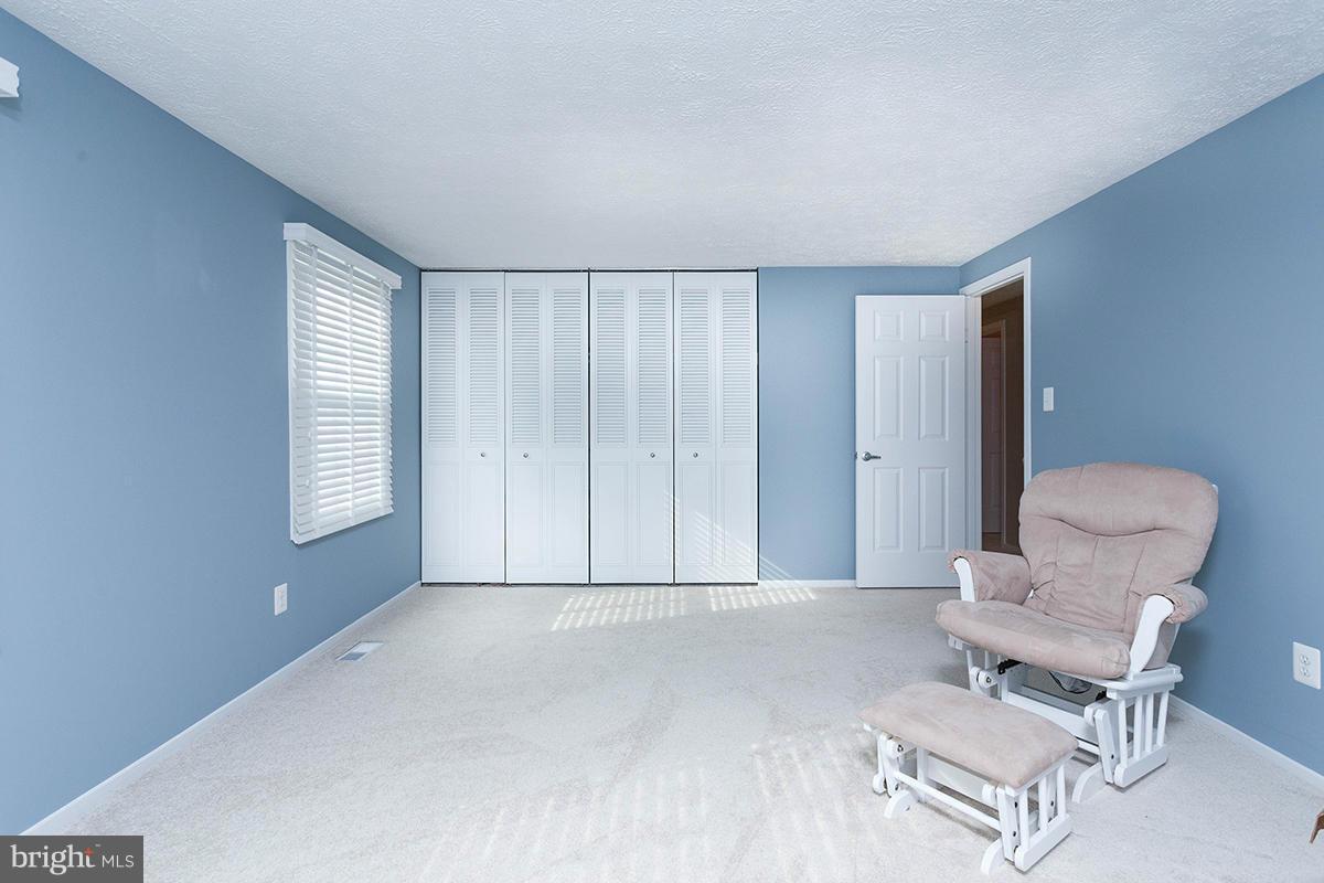 5750 Heming Avenue Springfield, VA 22151 - Photo 20 of 30 a living room with furniture and a window