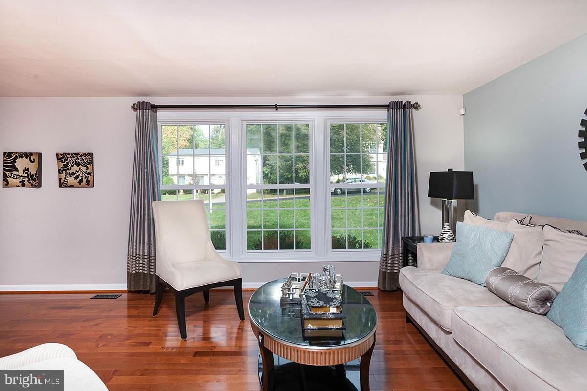 5750 Heming Avenue Springfield, VA 22151 - Photo 4 of 30 a living room with furniture and a large window