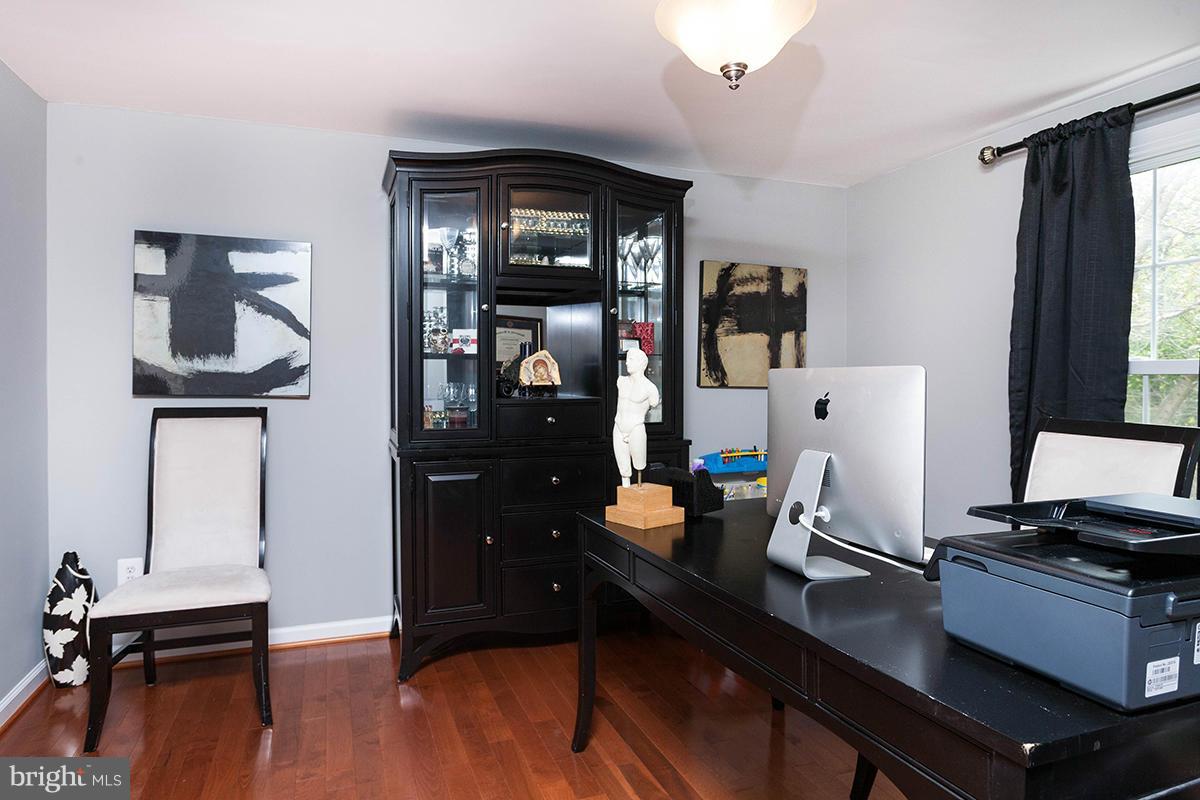 5750 Heming Avenue Springfield, VA 22151 - Photo 6 of 30 a view of a workspace with furniture and a window