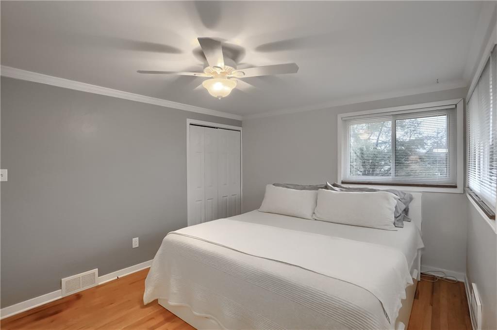 445 Rockhill Road Pittsburgh, PA 15243 - Photo 17 of 31 a bedroom with a bed and a window