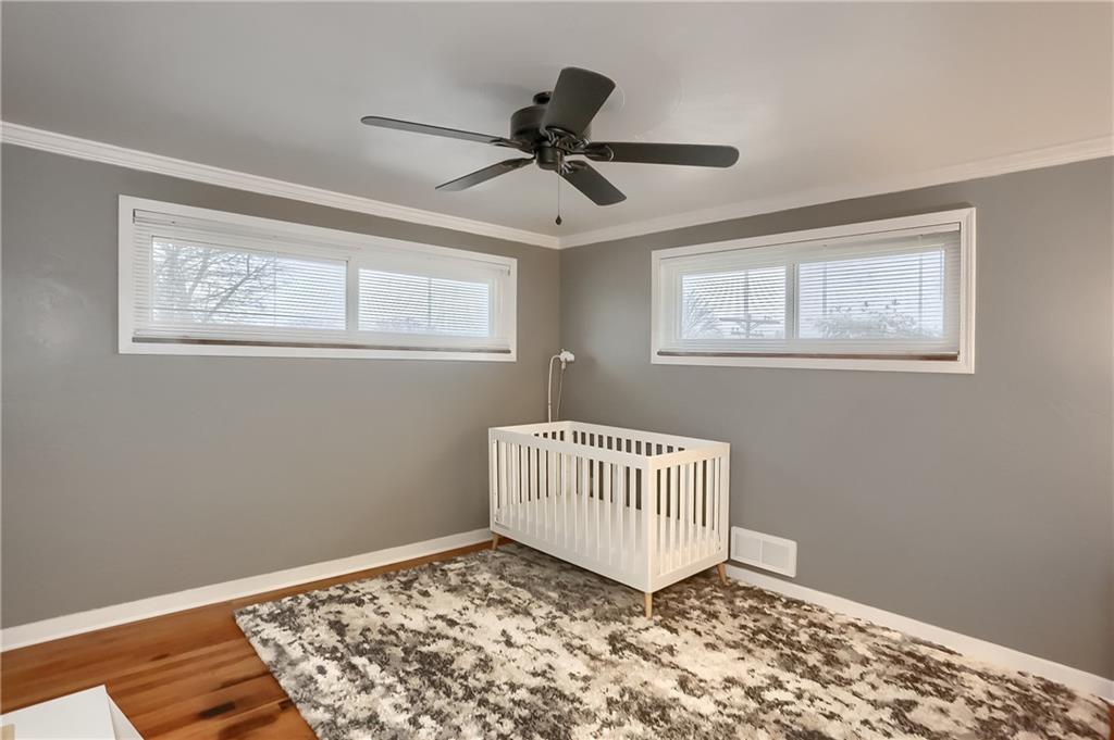 445 Rockhill Road Pittsburgh, PA 15243 - Photo 19 of 31 a living room with wooden floor and a window