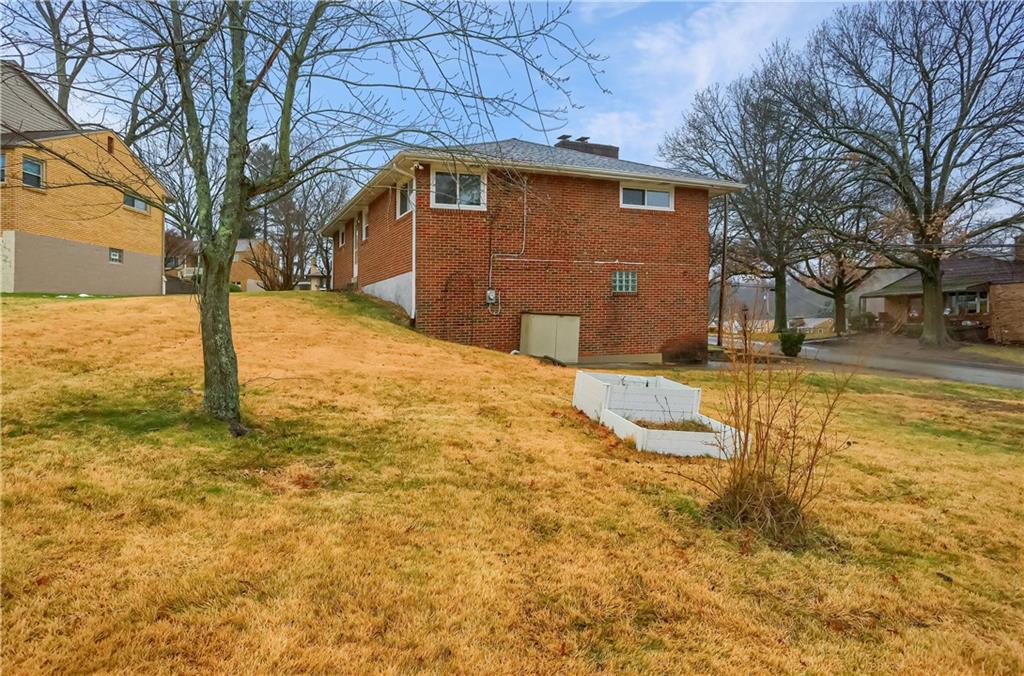 445 Rockhill Road Pittsburgh, PA 15243 - Photo 31 of 31 a view of a yard with a tree