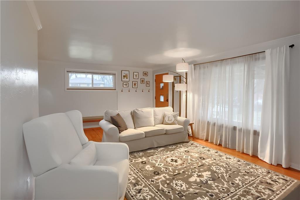 445 Rockhill Road Pittsburgh, PA 15243 - Photo 4 of 31 a living room with furniture and a rug