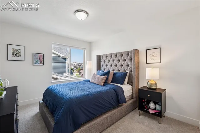 a bedroom with a bed and closet