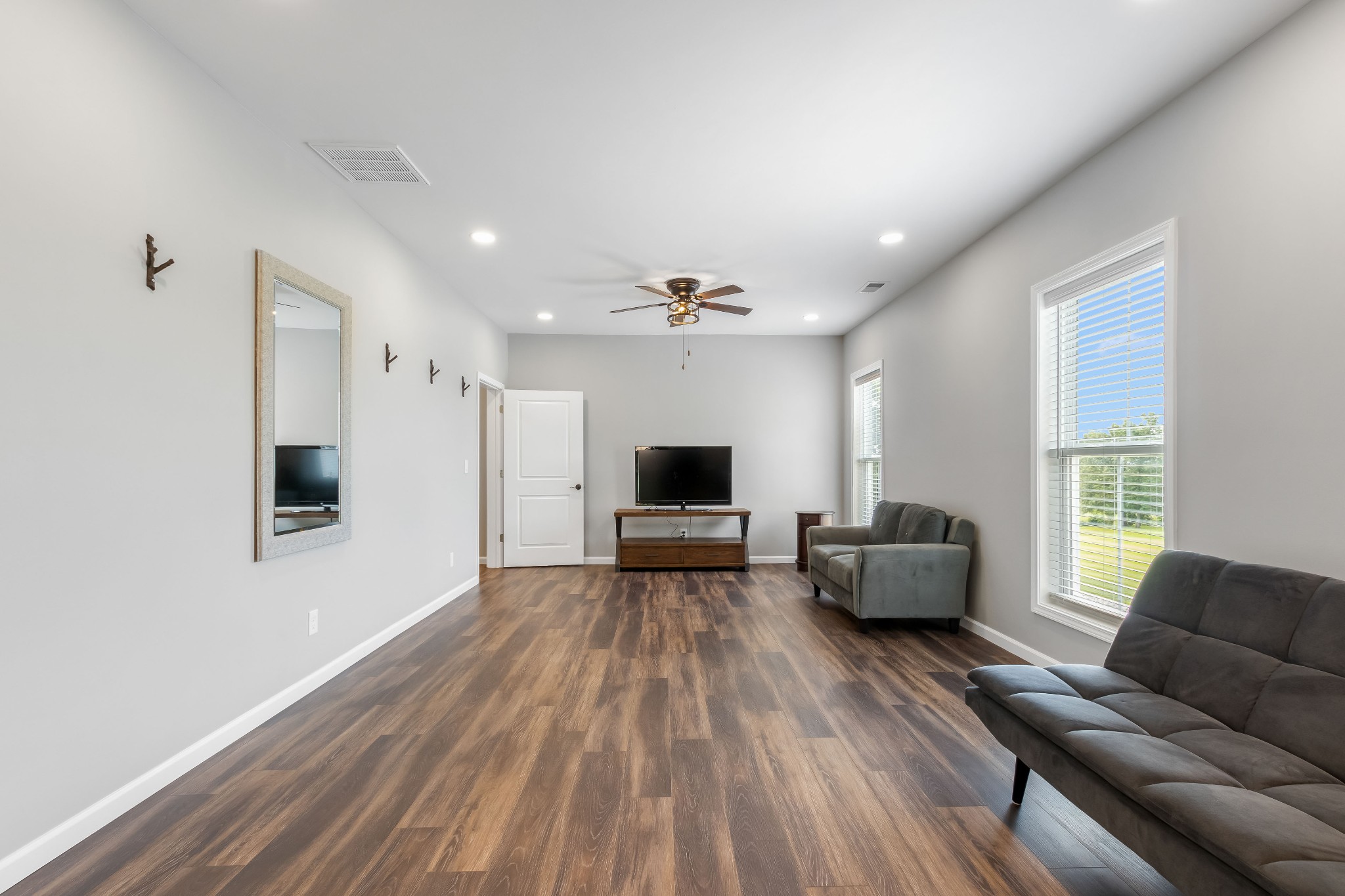 1049 Oregon Road Lascassas, TN 37085 - Photo 51 of 100 a living room with furniture and a fireplace