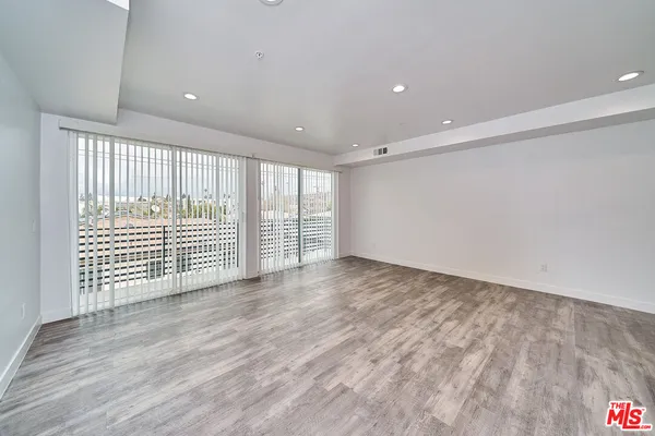 a view of kitchen with wooden floor
