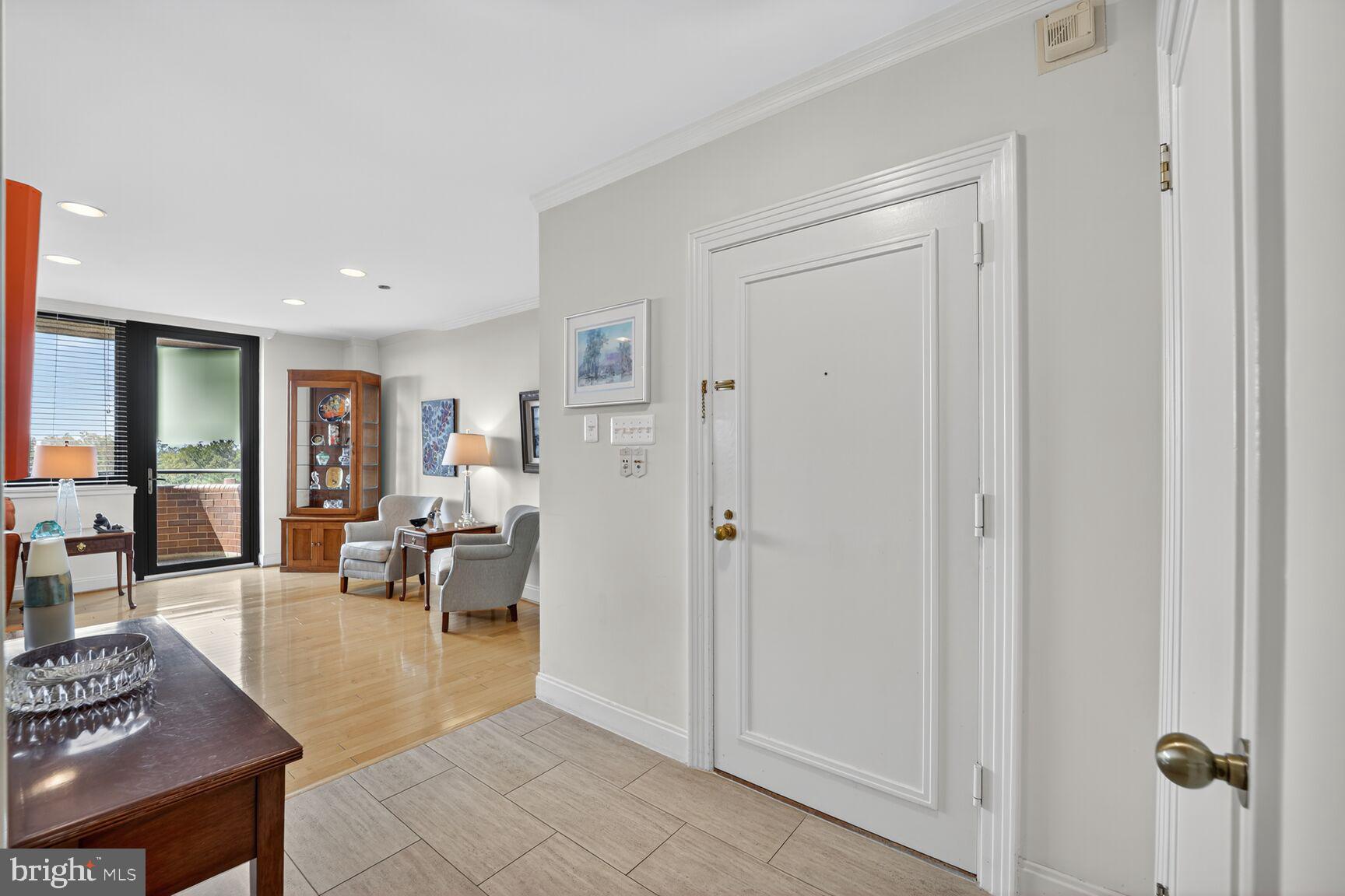 4550 North Park Avenue, Unit 1005 Chevy Chase, MD 20815 - Photo 2 of 30 a living room with furniture