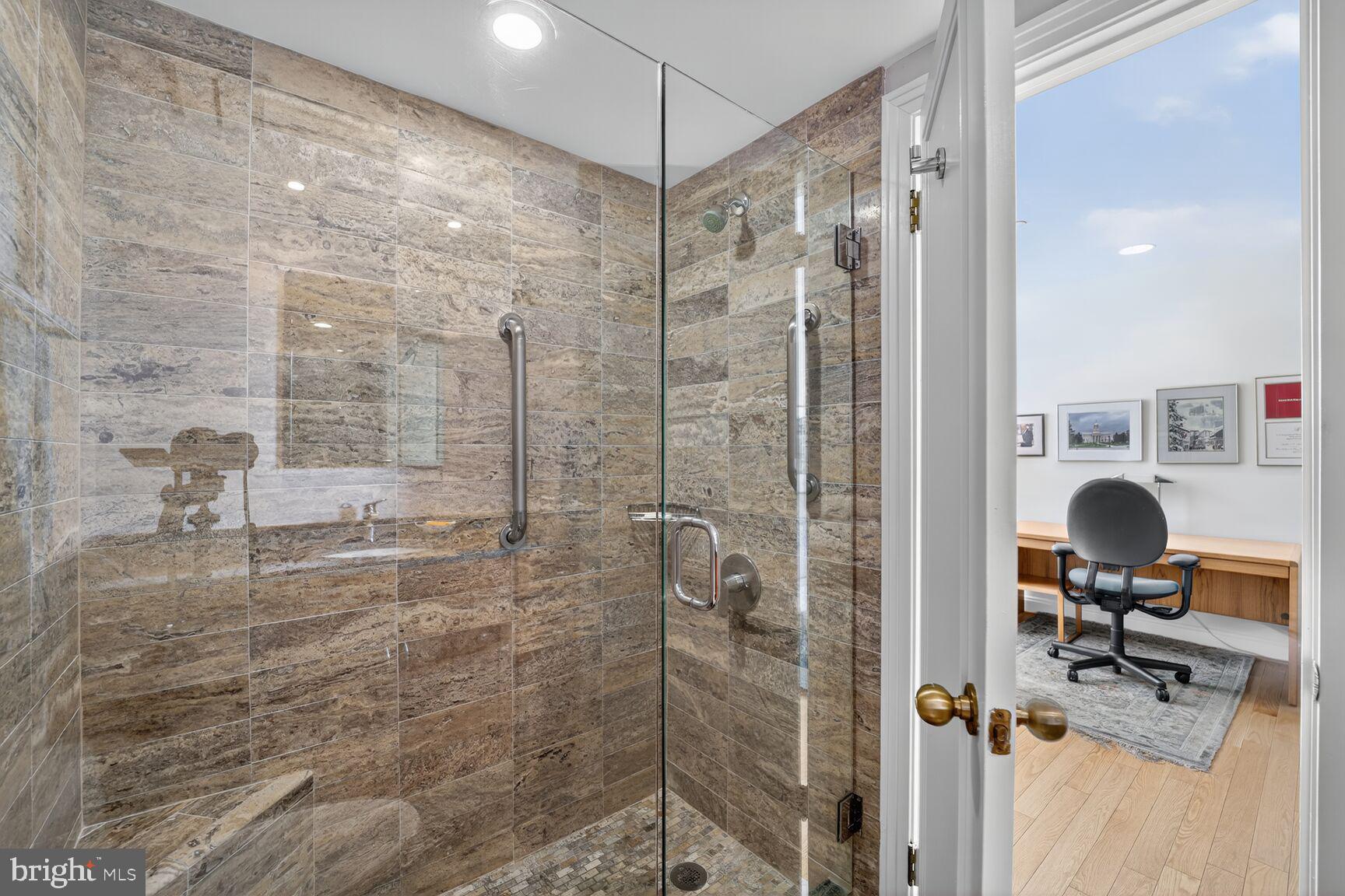 4550 North Park Avenue, Unit 1005 Chevy Chase, MD 20815 - Photo 27 of 30 a bathroom with a shower