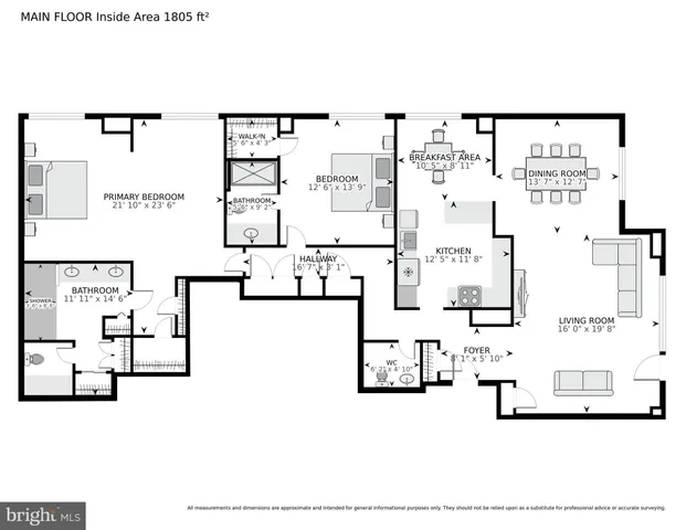 a view of a tall building next to a road