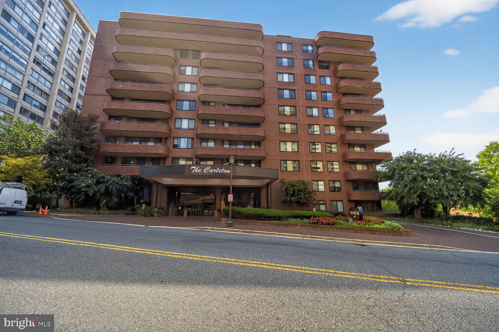 4550 North Park Avenue, Unit 1005 Chevy Chase, MD 20815 - Photo 29 of 30 a view of a tall building next to a road