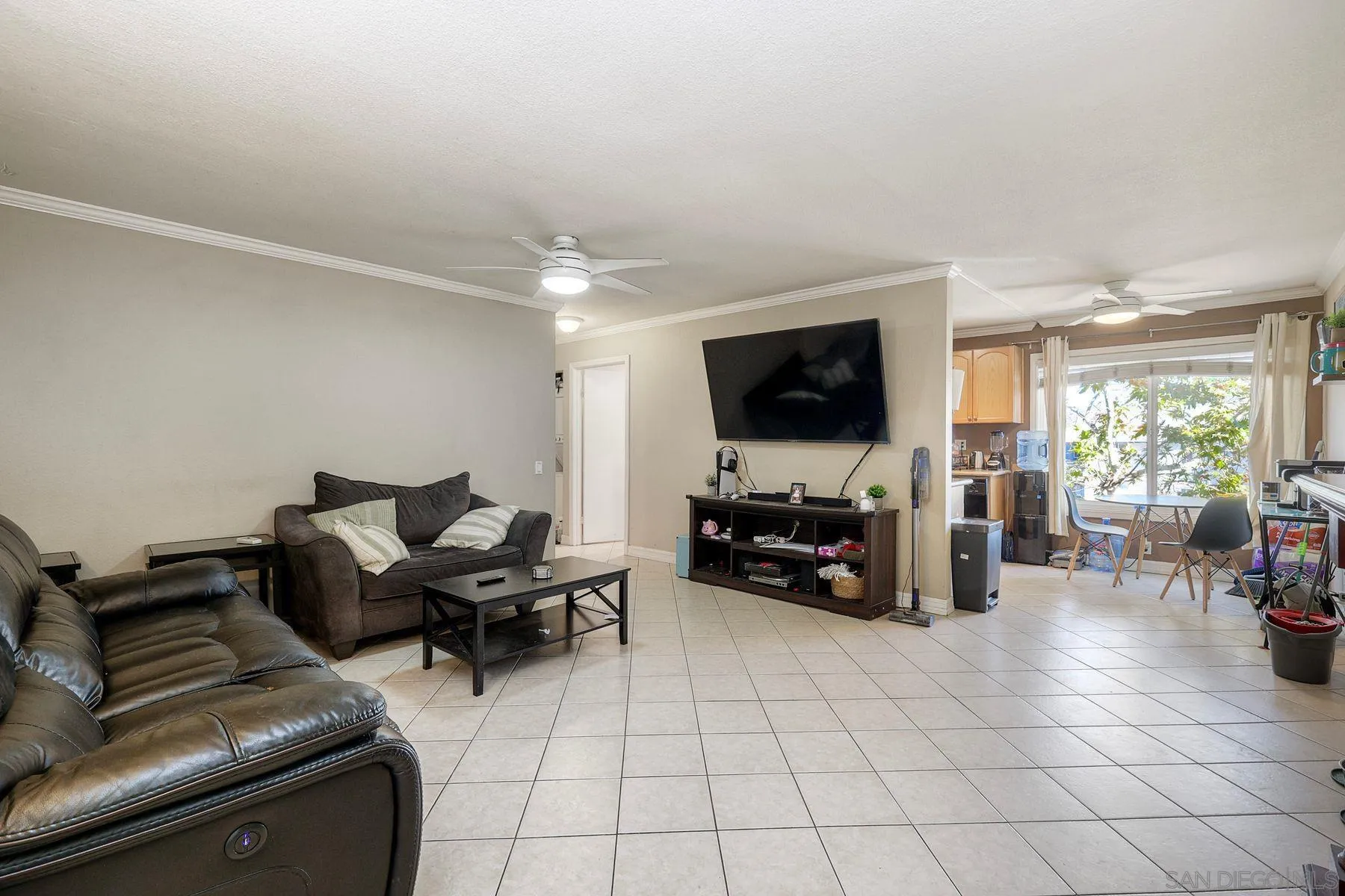 12923 Mapleview Street, Unit 6 Lakeside, CA 92040 - Photo 11 of 25 a living room with furniture and a flat screen tv