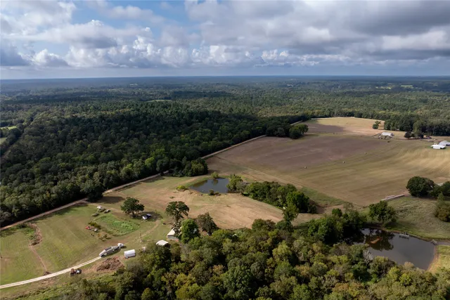 a view of a lake with a yard