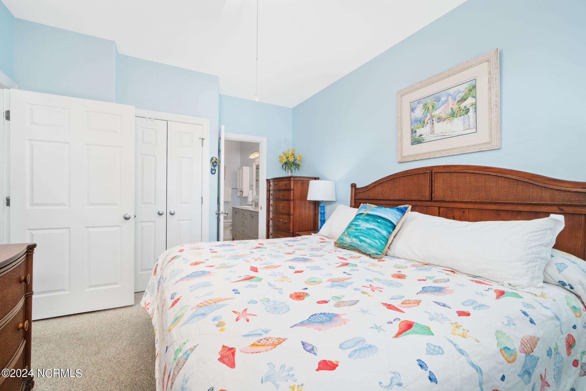1701 Salter Path Road, Unit B102 Indian Beach, NC 28512 - Photo 17 of 60 Primary bedroom suite