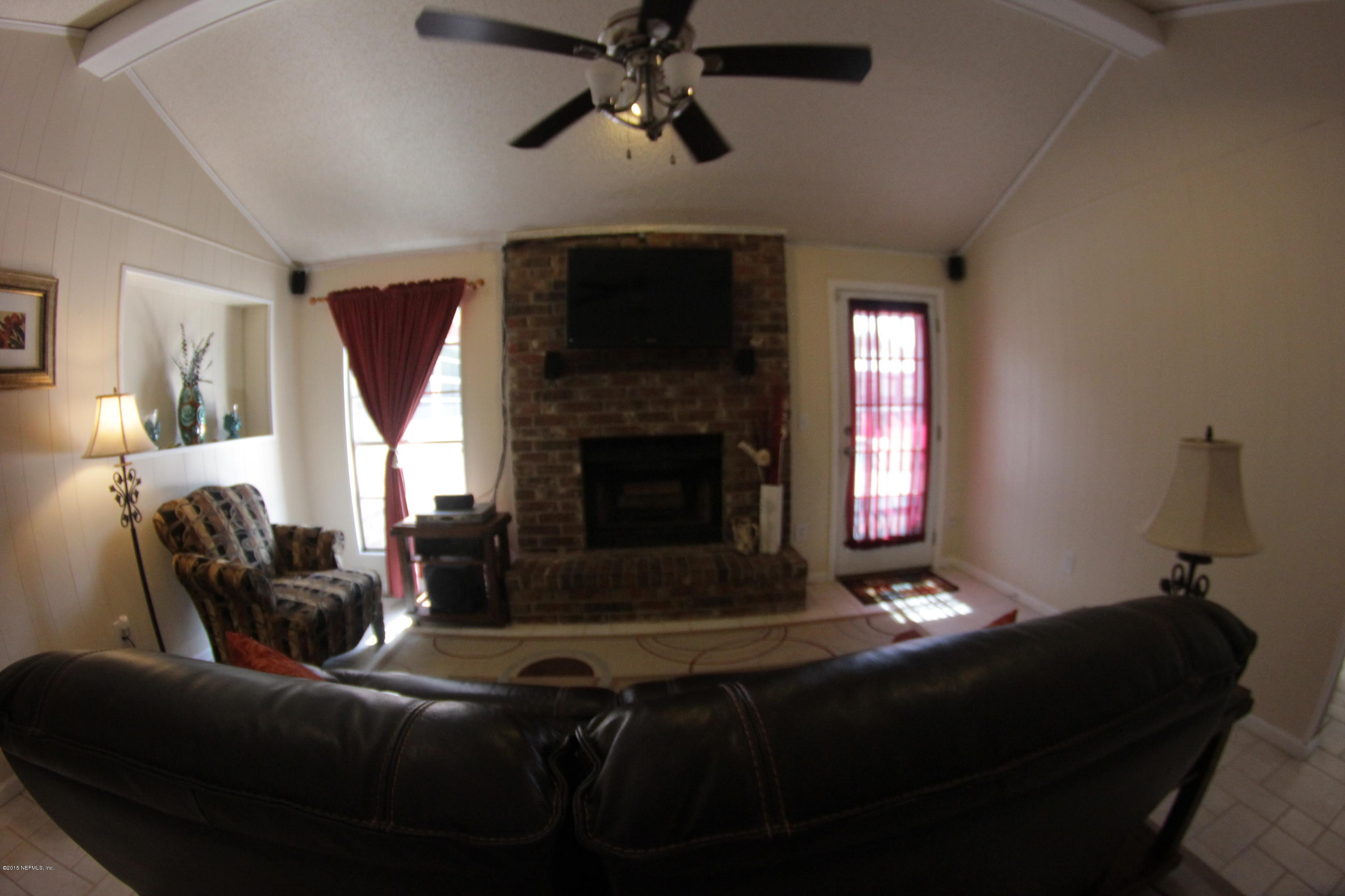 3905 Bo Tree Road Jacksonville, FL 32210 - Photo 12 of 54 Ceiling Fan in Family Room