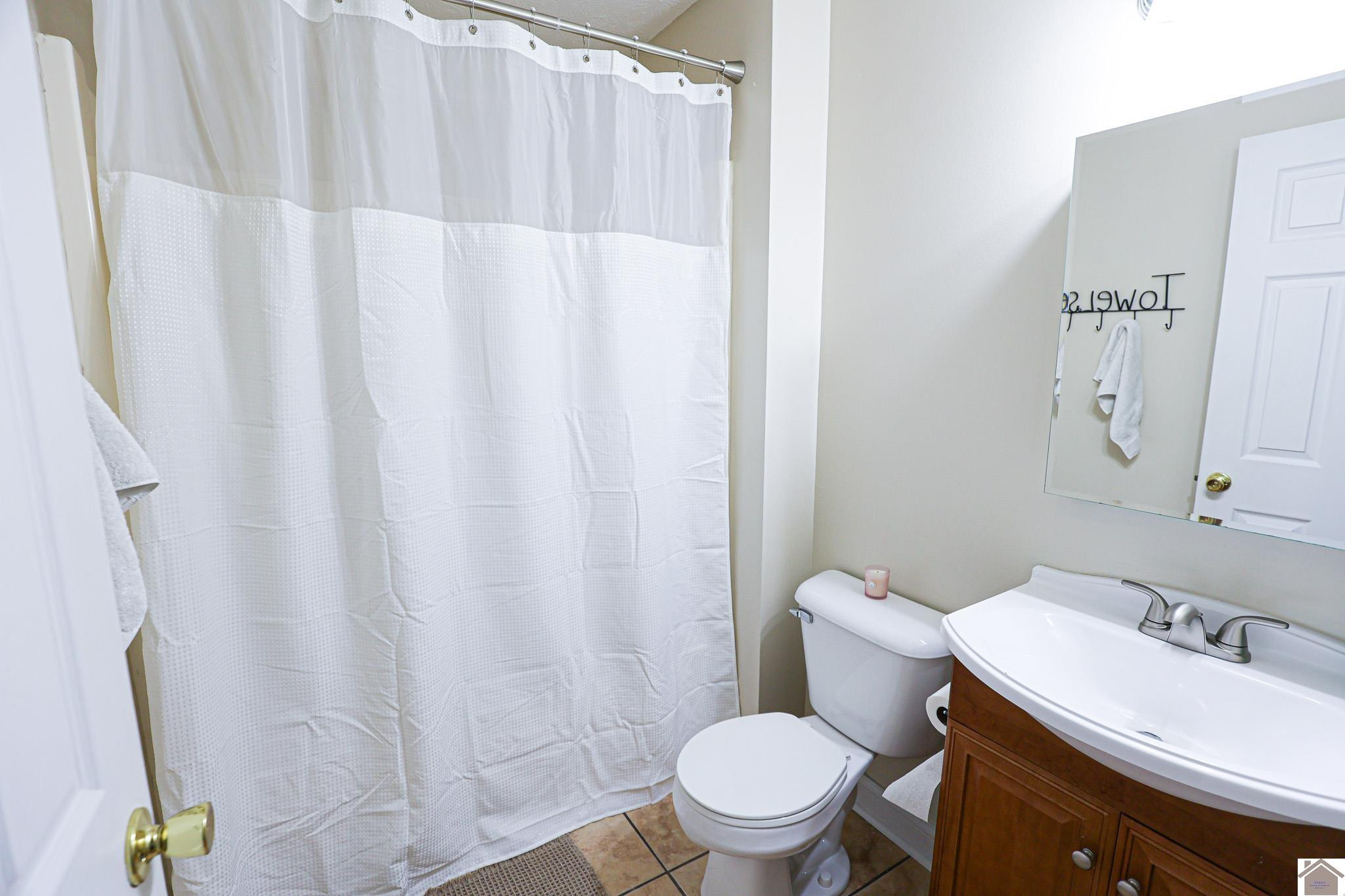 11930 Ogden Landing Road Kevil, KY 42053 - Photo 28 of 35 Guest Bathroom