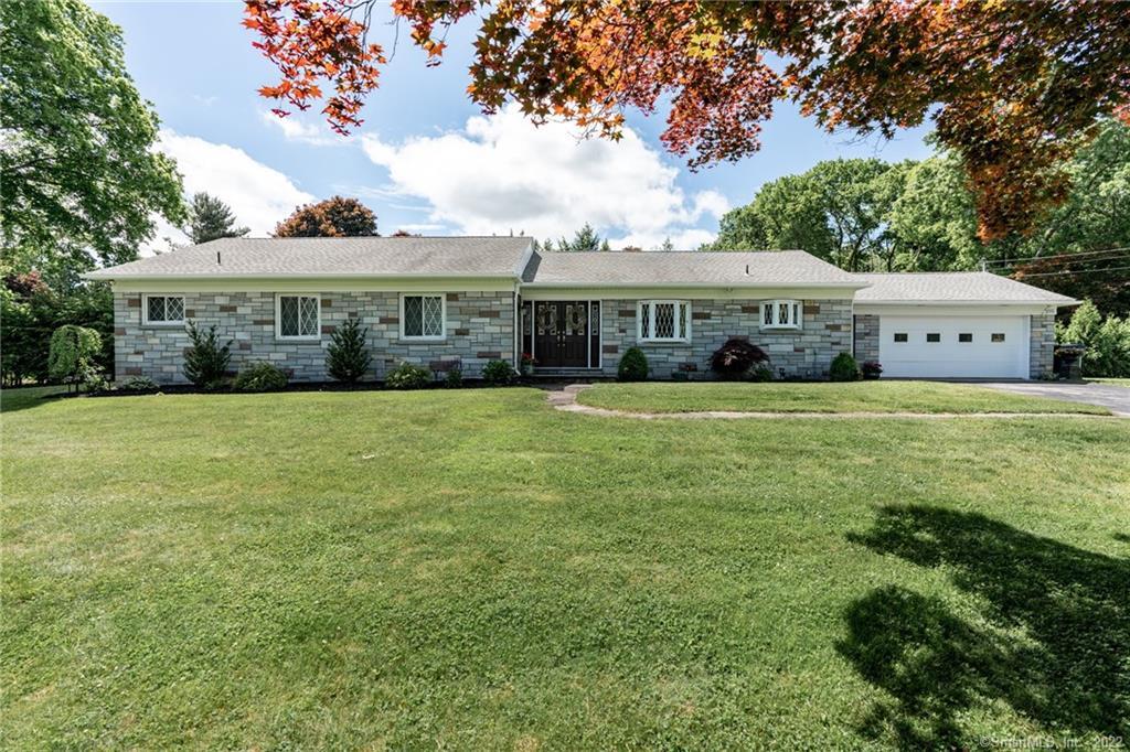 155 Curtis Farms Road Middlebury, CT 06762 - Photo 1 of 1 a view of a house with a big yard and large trees